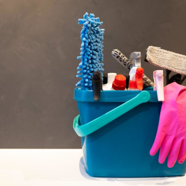 Professional cleaning bucket with accessories. Cleaning products concept